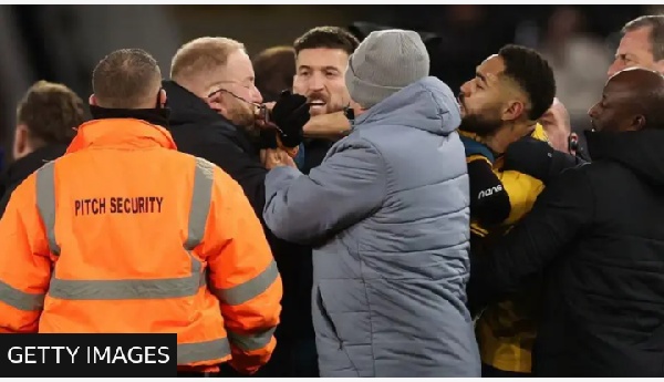 Matheus Cunha (right) appeared to knock the glasses off a member of Ipswich Town's security team