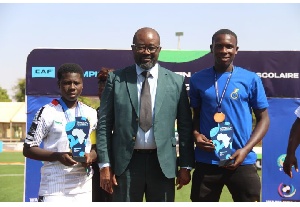 Cyril Acquah Hagan (left) with GFA president Kurt Okraku (m)