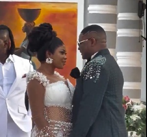 Enock Darko with his wife