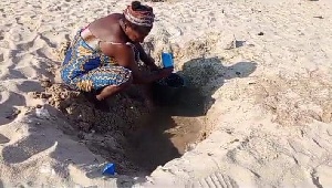 Lady digging for water