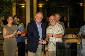 Mr. Herbert Friese, receiving his award from Mr. Jeroen Verheul, Netherlands Ambassador to Ghana