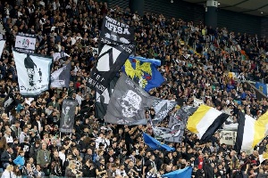 Udinese supporters cheer during the Italian Serie A soccer match
