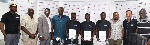 Officials of IMAX and GBA with some boxers