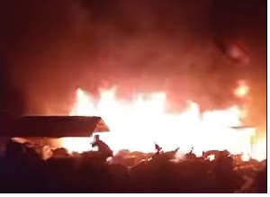 The blaze started in a wooden structure around 1 p.m.