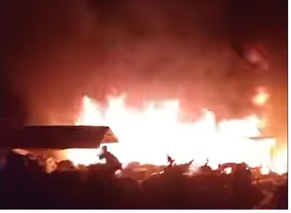 The blaze started in a wooden structure around 1 p.m.