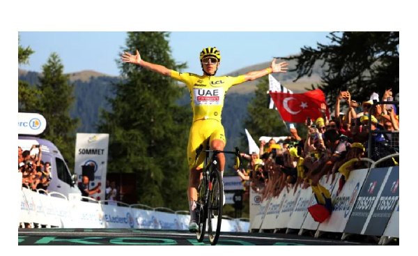 Tadej Pogačar celebrates winning stage 20 of this year's Tour de France.