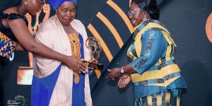 Akosua Frema Osei-Opare, receiving the award on behalf of Former President Akufo-Addo